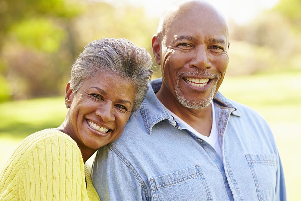 Smiling couple outside