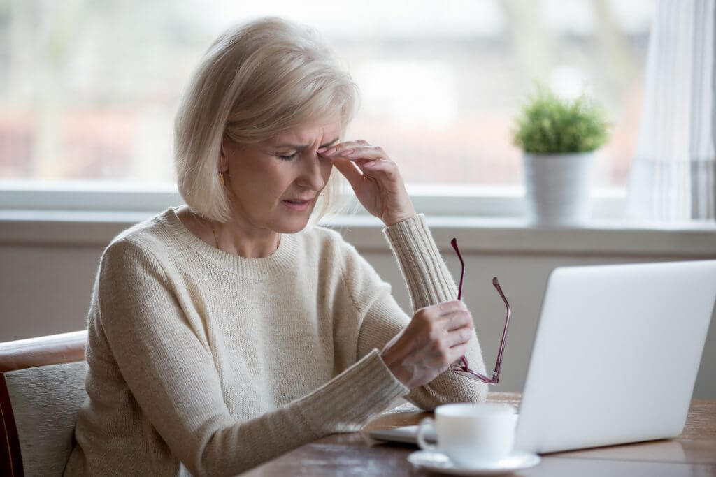 Older woman suffering from dry eye